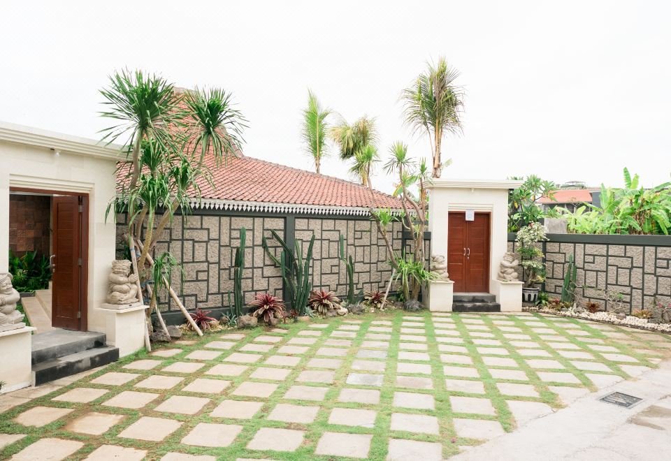 Musa Canggu peaceful pool and garden area