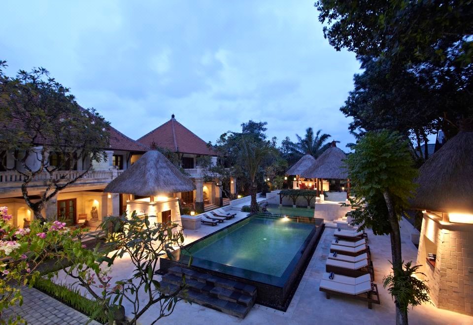 Griya Santrian beach resort gardens and pools